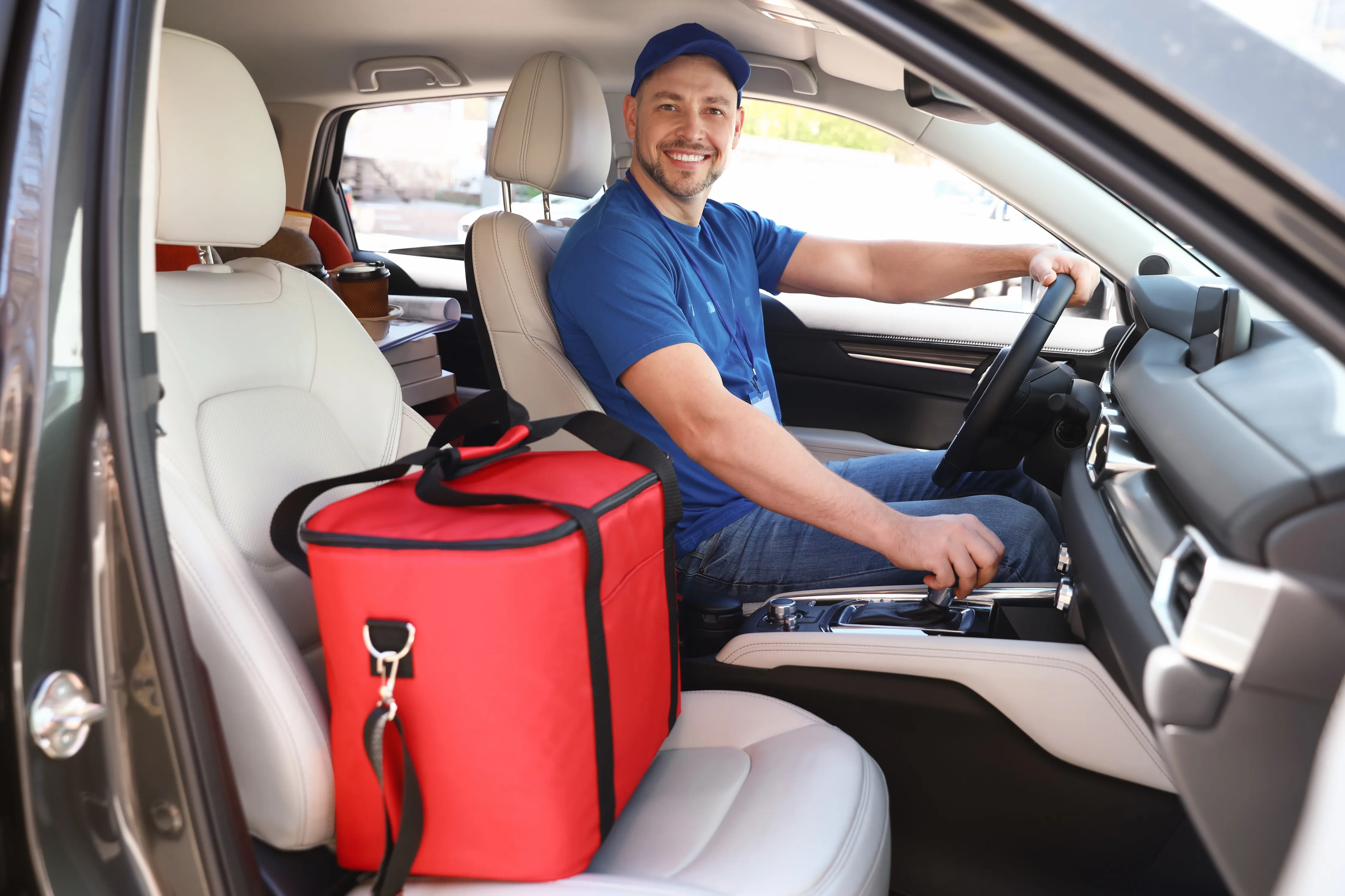 Medical courier delivering specimens in professional attire